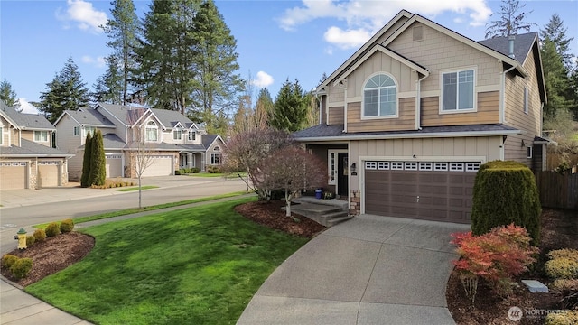 view of front of property featuring board and batten siding, a residential view, concrete driveway, a front yard, and an attached garage