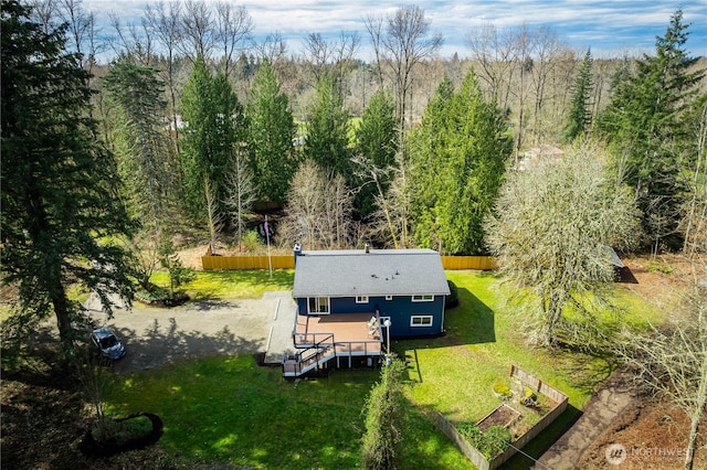 view from above of property featuring a forest