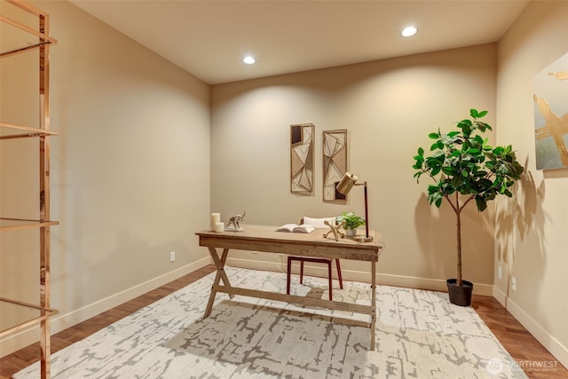 home office featuring recessed lighting, wood finished floors, and baseboards