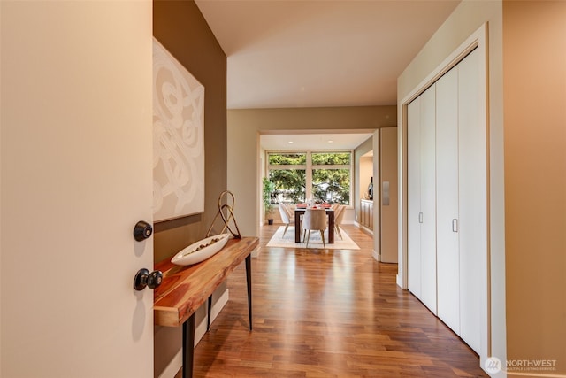 hall featuring wood finished floors