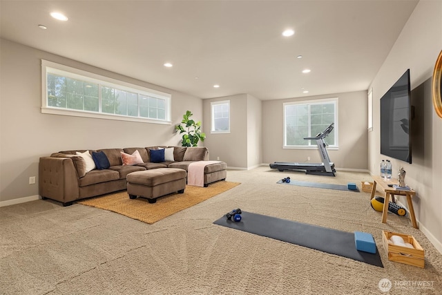 workout room featuring recessed lighting, baseboards, and carpet
