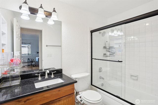 705 NE 143rd Ave Unit A1, Bellevue, WA 98007 - bathroom with vanity, toilet, and shower / bath combination with glass door