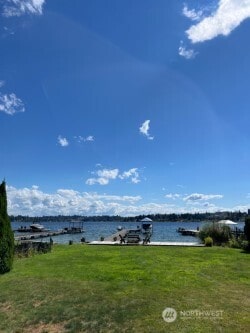 property view of water featuring a dock