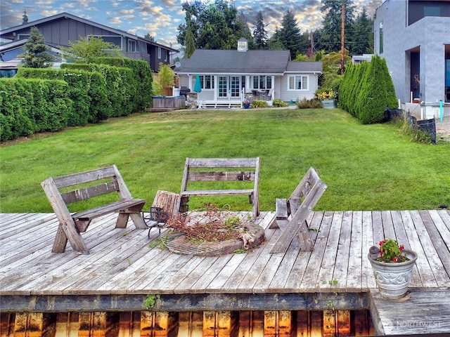 exterior space featuring a deck and a yard