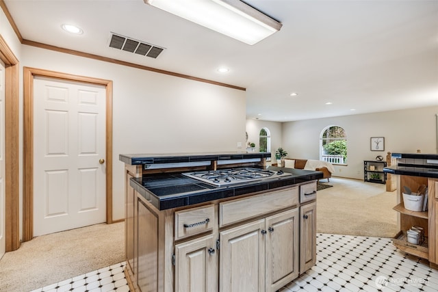 kitchen featuring crown molding, gas stovetop, open floor plan, visible vents, and recessed lighting