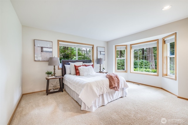 bedroom featuring visible vents, carpet, baseboards, and recessed lighting