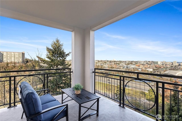 balcony featuring a city view
