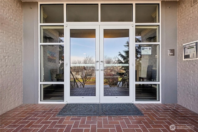 doorway to property featuring french doors