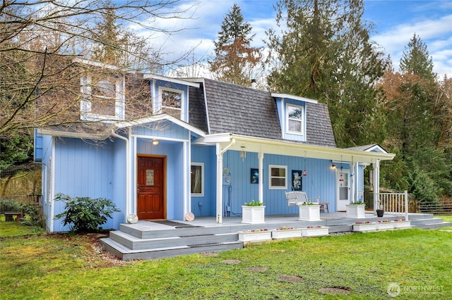 3348 SW Christmas Tree Ln, Port Orchard, WA 98367 - view of front facade featuring covered porch, a front yard, roof with shingles, and mansard roof