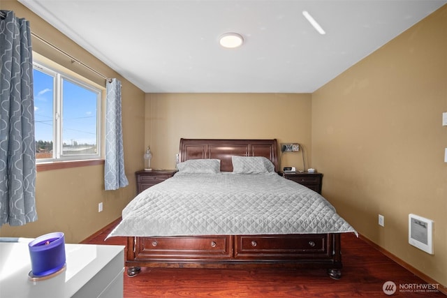 6473 Trigg Woods Ln, Ferndale, WA 98248 - bedroom with dark wood-style floors and heating unit