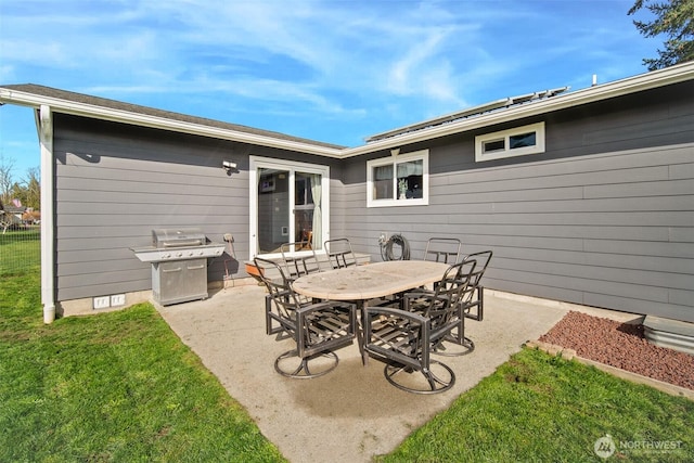 6473 Trigg Woods Ln, Ferndale, WA 98248 - view of patio with a grill and outdoor dining area