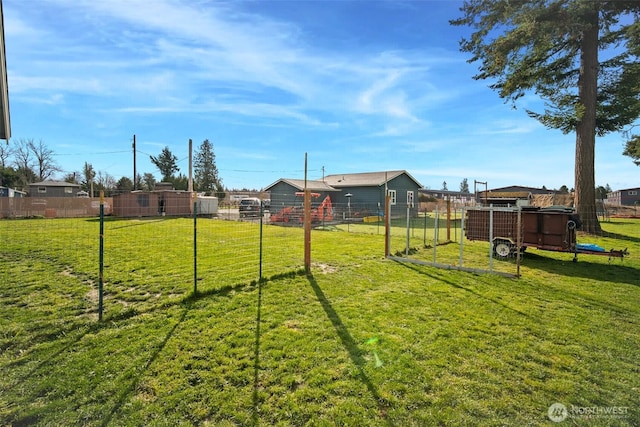 6473 Trigg Woods Ln, Ferndale, WA 98248 - view of yard featuring an outdoor structure and fence