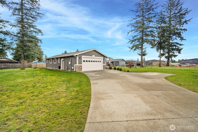 6473 Trigg Woods Ln, Ferndale, WA 98248 - single story home featuring a front yard, concrete driveway, fence, and a garage
