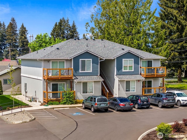 20107 Blair Ln, Rochester, WA 98579 - view of front of house featuring a shingled roof and uncovered parking