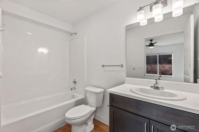 20107 Blair Ln, Rochester, WA 98579 - bathroom with toilet, a ceiling fan, wood finished floors, shower / bath combination, and vanity