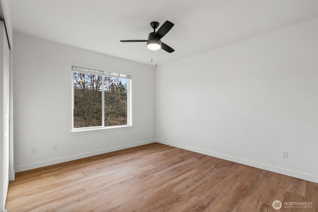 20107 Blair Ln, Rochester, WA 98579 - unfurnished room with ceiling fan, baseboards, and wood finished floors