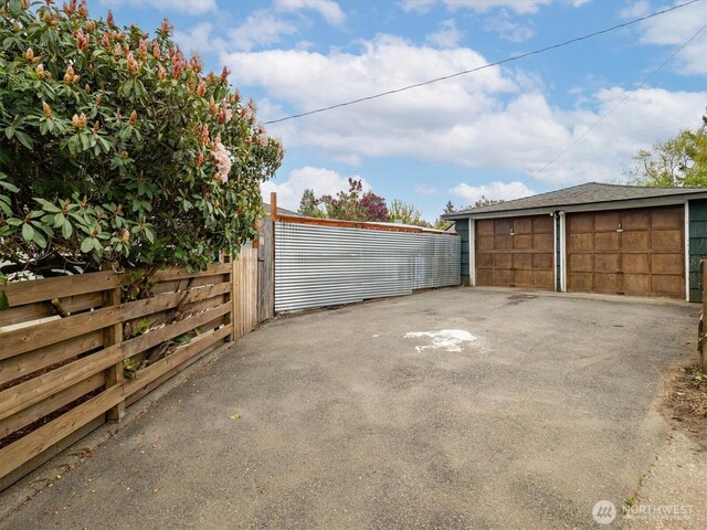 detached garage with fence