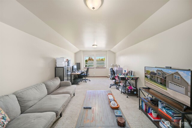 office featuring carpet and vaulted ceiling