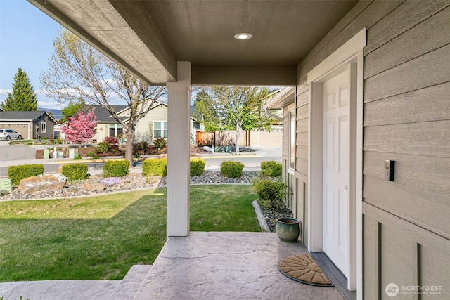 view of patio with a residential view