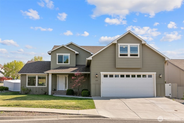 view of front of house featuring fence, roof with shingles, a garage, a front yard, and concrete driveway