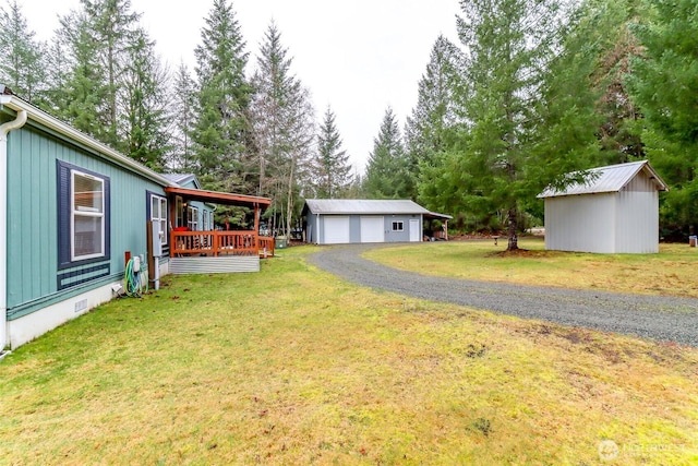 440 Cannon Rd, Packwood, WA 98361 - view of yard with an outdoor structure and a garage