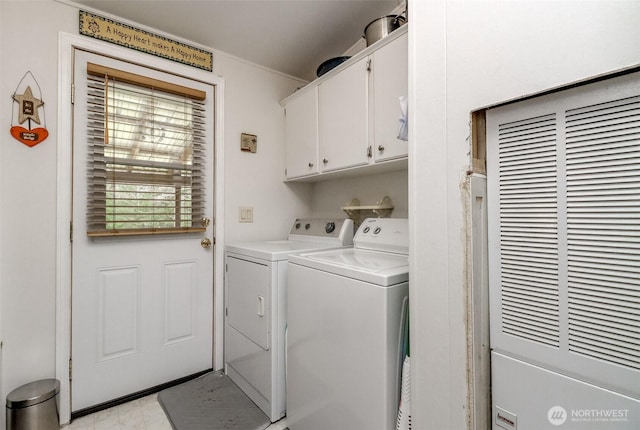 440 Cannon Rd, Packwood, WA 98361 - laundry area with washing machine and dryer, cabinet space, and a heating unit