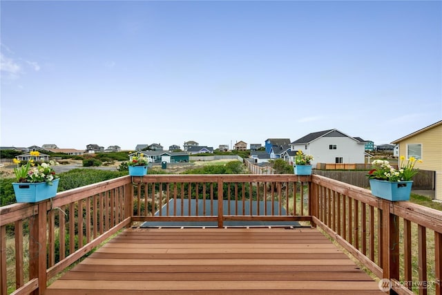 1205 Fairwood Dr SW, Ocean Shores, WA 98569 - wooden deck featuring a residential view