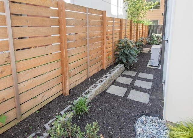 view of yard featuring fence