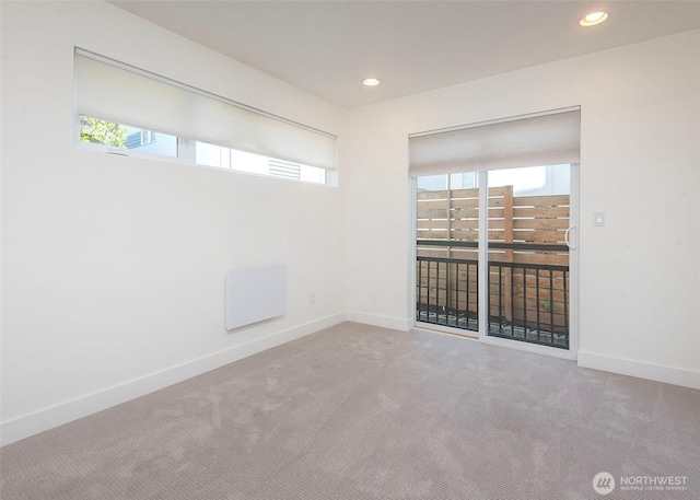 unfurnished room featuring carpet floors, recessed lighting, and baseboards