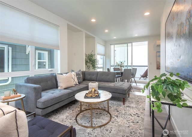 living area featuring recessed lighting and wood finished floors