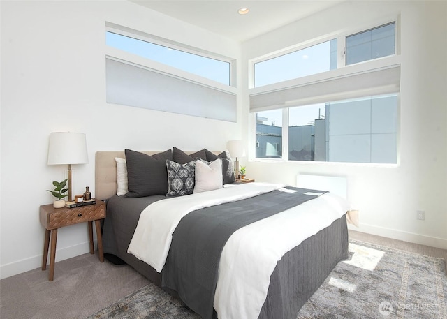 carpeted bedroom with baseboards and recessed lighting