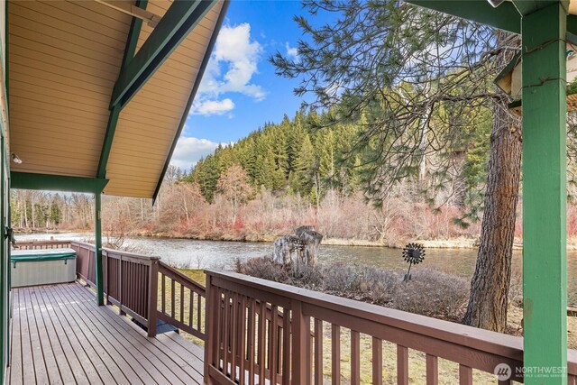 1081 Wapiti Dr, Cle Elum, WA 98922 - wooden terrace featuring a water view and a view of trees