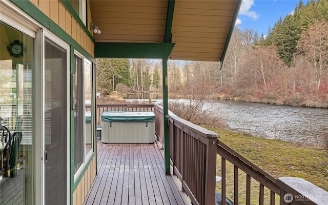 1081 Wapiti Dr, Cle Elum, WA 98922 - wooden deck with a hot tub and a water view