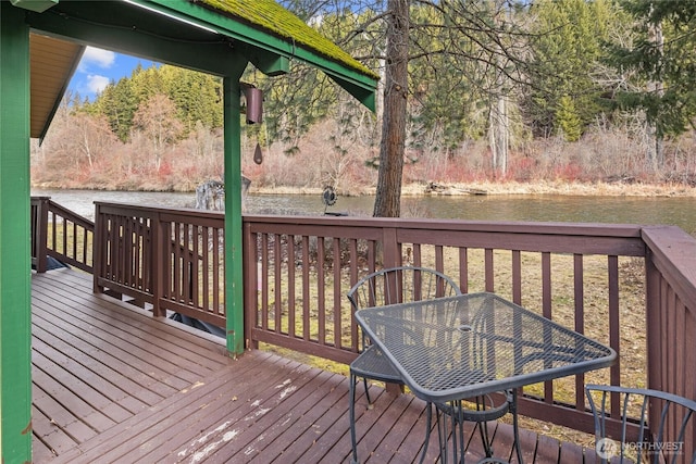 1081 Wapiti Dr, Cle Elum, WA 98922 - wooden terrace featuring a water view and outdoor dining space