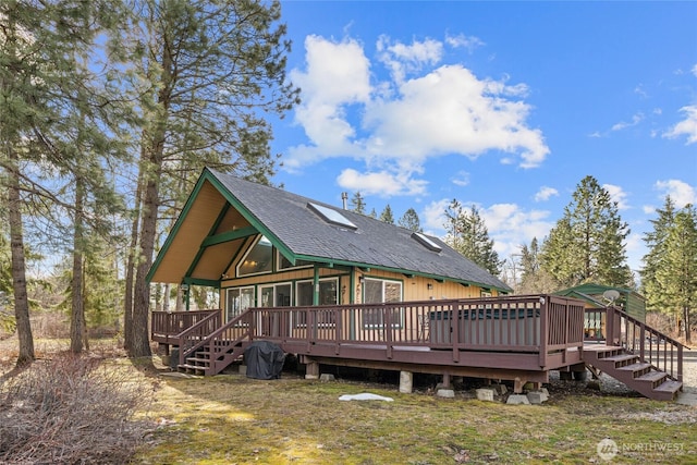 1081 Wapiti Dr, Cle Elum, WA 98922 - rear view of property with stairs, a wooden deck, and a shingled roof