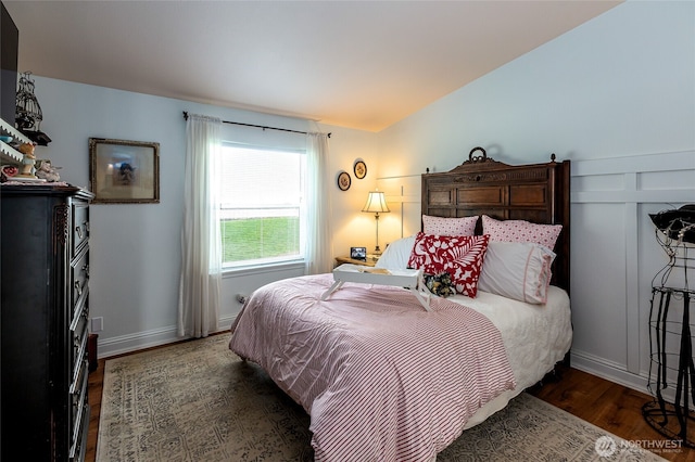 bedroom featuring wood finished floors