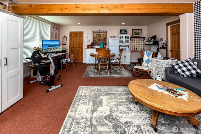 living area featuring carpet floors