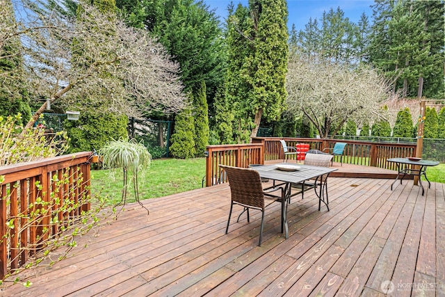 2913 SE Forest Villa Ct, Port Orchard, WA 98366 - wooden deck with outdoor dining space and a lawn