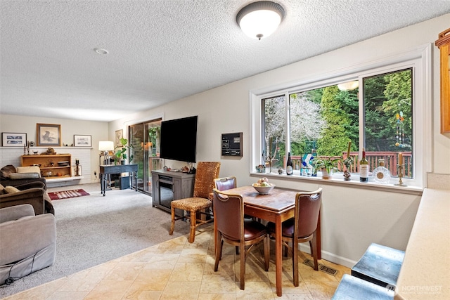 2913 SE Forest Villa Ct, Port Orchard, WA 98366 - dining space with a textured ceiling