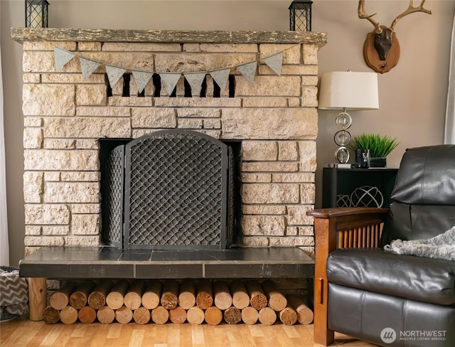 4200 N Pl, Seaview, WA 98644 - detailed view of a fireplace with raised hearth and wood finished floors