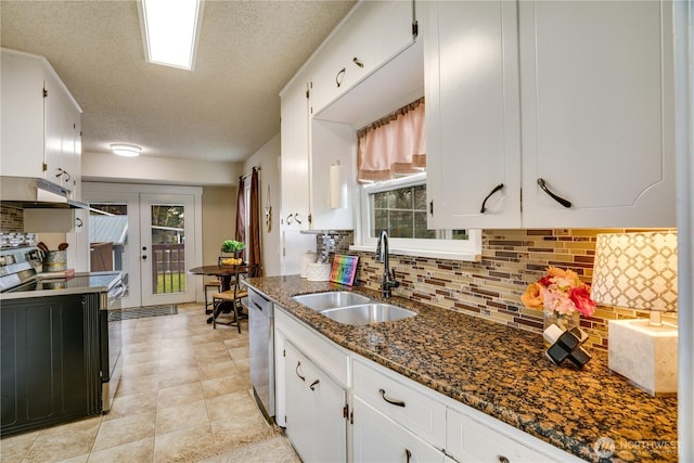kitchen with white cabinets, dishwasher, under cabinet range hood, electric stove, and a sink