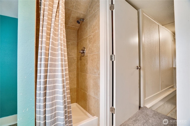 full bath with a shower stall