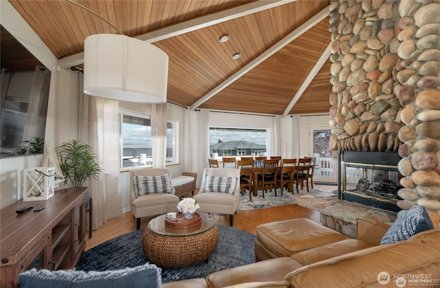 6926 Holeman Ave, Blaine, WA 98230 - living room with wood ceiling, vaulted ceiling with beams, and wood finished floors