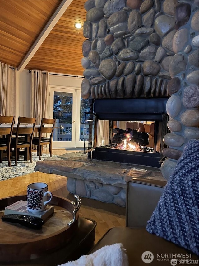6926 Holeman Ave, Blaine, WA 98230 - interior space with wood ceiling, beam ceiling, and a stone fireplace