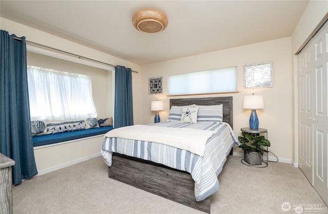 6926 Holeman Ave, Blaine, WA 98230 - carpeted bedroom with a closet and baseboards