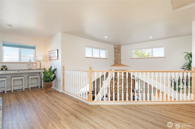 6926 Holeman Ave, Blaine, WA 98230 - hallway featuring recessed lighting, a healthy amount of sunlight, and wood finished floors