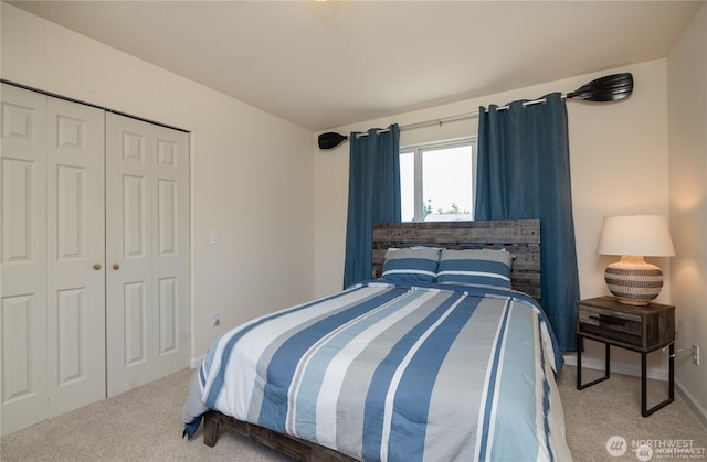 6926 Holeman Ave, Blaine, WA 98230 - carpeted bedroom with baseboards and a closet