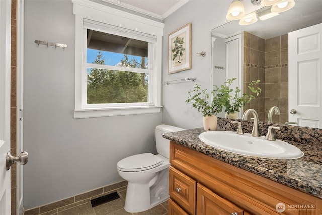 full bathroom with crown molding, vanity, visible vents, toilet, and baseboards