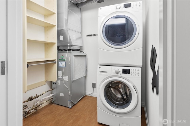 10700 NE 4th St Unit 3108, Bellevue, WA 98004 - washroom featuring stacked washer and clothes dryer