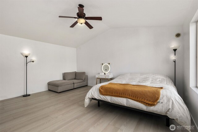 21813 43rd Avenue Ct E, Spanaway, WA 98387 - bedroom featuring vaulted ceiling, light wood-type flooring, and a ceiling fan